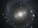 Barred Spiral Galaxy Swirls in the Night Sky
