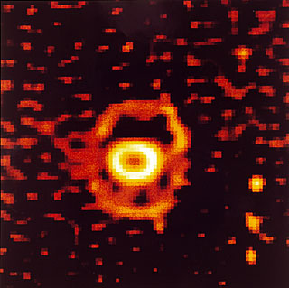Ring-shaped nebula around SN 1987A