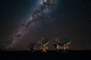 Four ALMA antennas on the Chajnantor plain