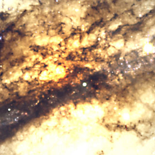 The Heavily Obscured Centre of Centaurus A