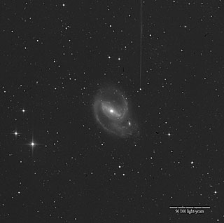 The Barred Spiral Galaxy NGC 1097