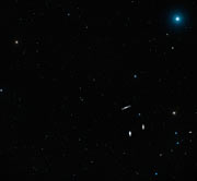 Wide-field view of the sky around the Leo Triplet of galaxies