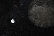 Impresión artística del planeta enano Eris y su luna Dysnomia