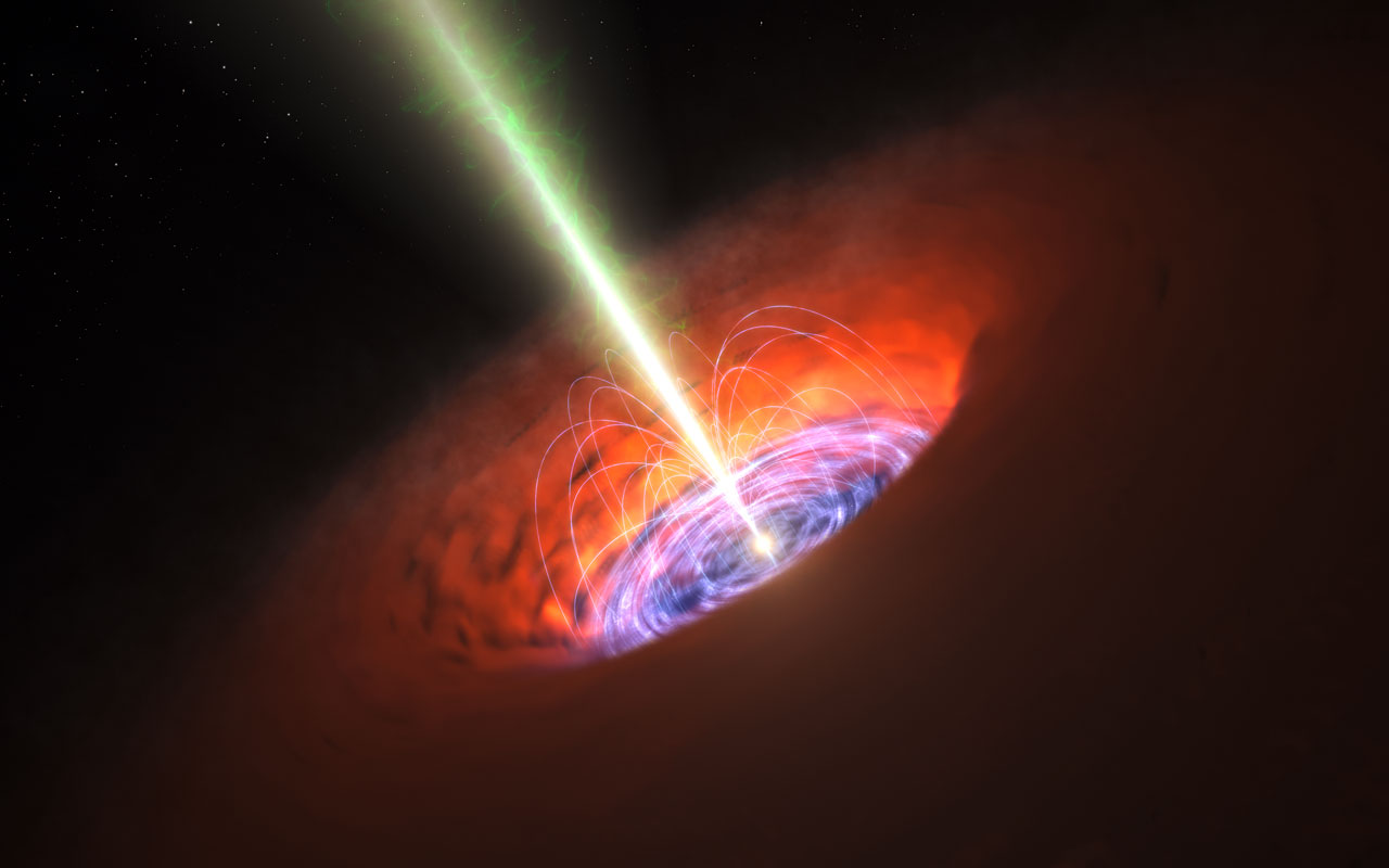 Esta ilustración muestra el entorno de un agujero negro supermasivo, típico en el centro de muchas galaxias. El propio agujero negro está rodeado por un brillante disco de acreción de material muy caliente que se precipita hacia él y, más allá, por un toro polvoriento. También hay, a menudo, chorros de material eyectado a alta velocidad desde los polos del agujero negro que pueden extenderse a grandes distancias en el espacio. Observaciones llevadas a cabo con ALMA han detectado un campo magnético muy fuerte cerca del agujero negro, en la base de los chorros, y esto, probablemente, está relacionado con la generación de los chorros y su colimación.