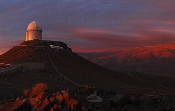 Mounted image 001:La Silla Observatory at sunset with a rare cloudscape