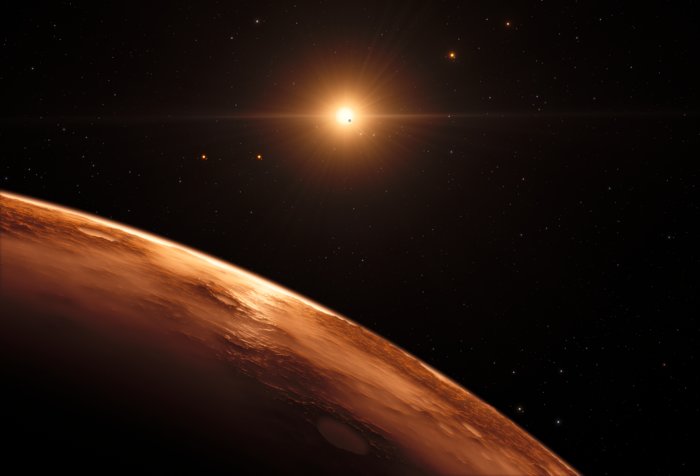 Artystyczna wizja widoku z odległej planety w systemie TRAPPIST-1
