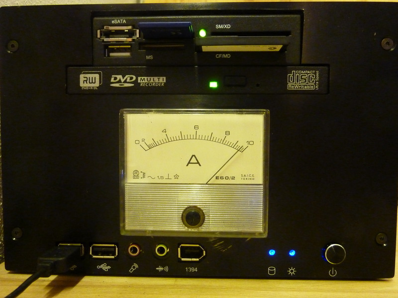 Front view showing Personalized Computer under full load with moving iron ammeter (at 9.6A), spinning DVD and card reader with SDHC and CF cards
