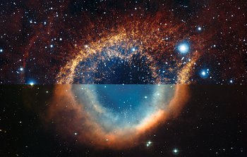 Infrared/visible light comparison view of the Helix Nebula