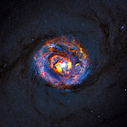 Veduta composita della galassia NGC 1433 ottenuta da ALMA e Hubble