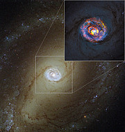 Het nabije actieve sterrenstelsel NGC 1433, zoals gezien door ALMA en Hubble