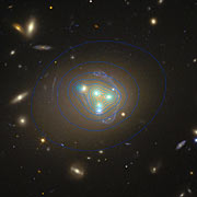 Hubble image of galaxy cluster Abell 3827 showing dark matter distribution