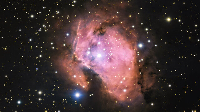 A bubblegum-pink nebula