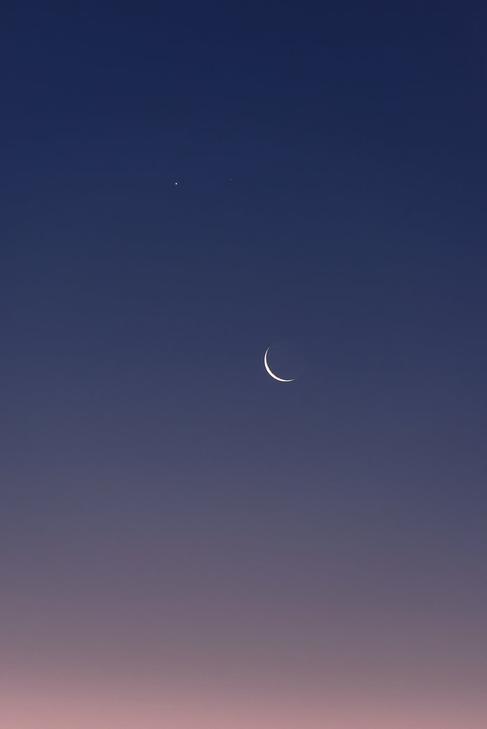 Venus and Mars above the crescent Moon