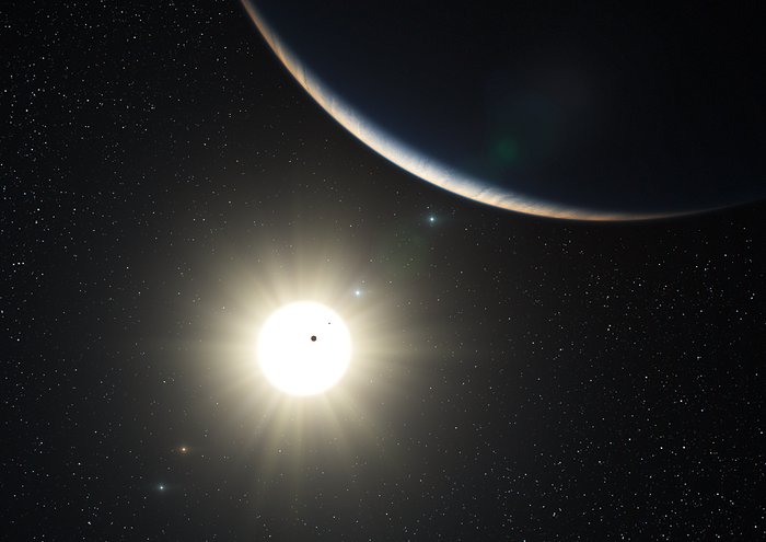 El sistema planetario alrededor del la estrella HD 10180 similar al Sol (impresión artística)