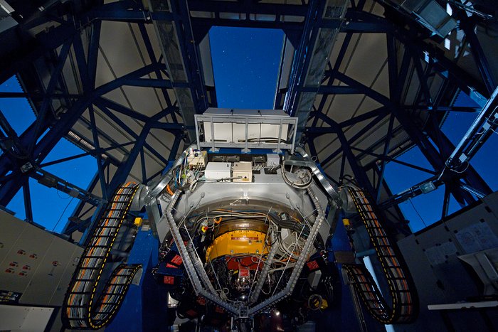 The VLT Survey Telescope observing on a moonlit night