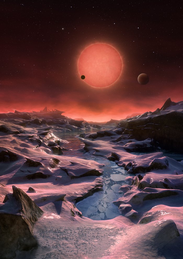 Künstlerische Darstellung des sehr kühlen Zwergsterns TRAPPIST-1 von der Oberfläche eines seiner Planeten