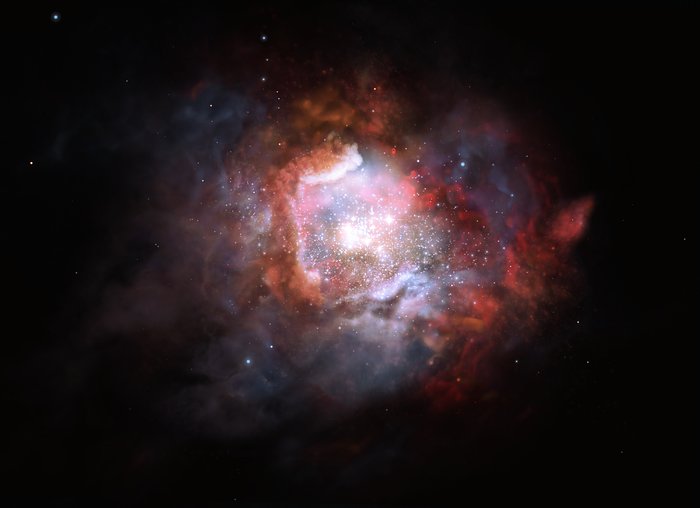 Illustration af en galakse med kraftig stjernedannelse - en starburstgalakse
