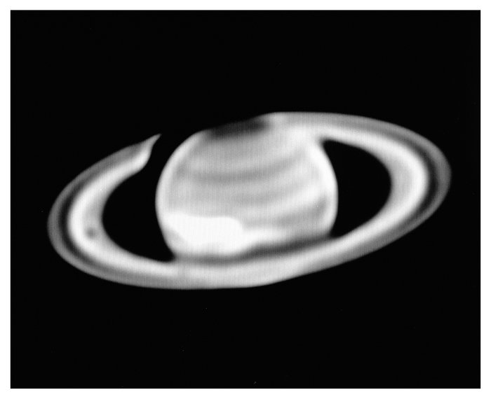 Saturn and the Giant White Spot