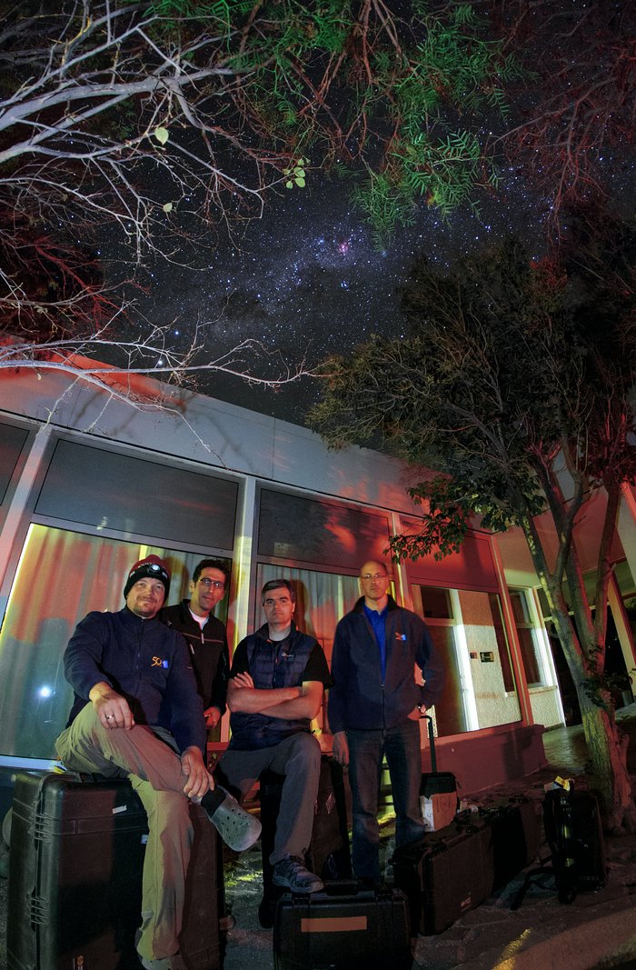 ESO Ultra HD Expedition team just outside the hotel area at La Silla at night