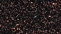 Zoom em direção à galáxia ESO 137-001