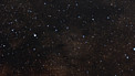 Zoom em direção à nebulosa escura LDN 483