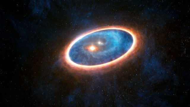 Představa dvojhvězdného systému GG Tauri-A