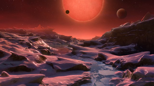 Vue d’artiste de l’étoile naine extrêmement froide TRAPPIST-1 depuis la surface d’une de ses planètes