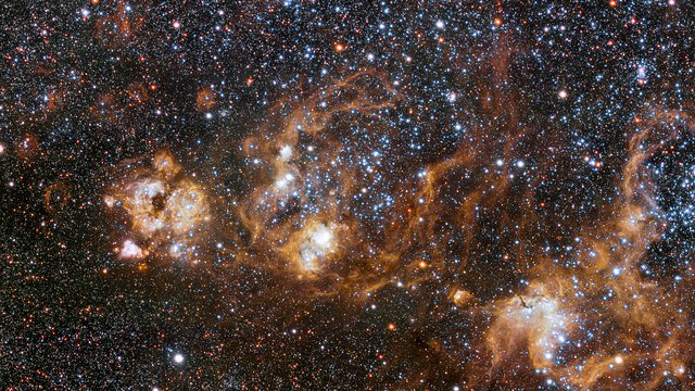 Panning across the rich region around the Tarantula Nebula in the Large Magellanic Cloud