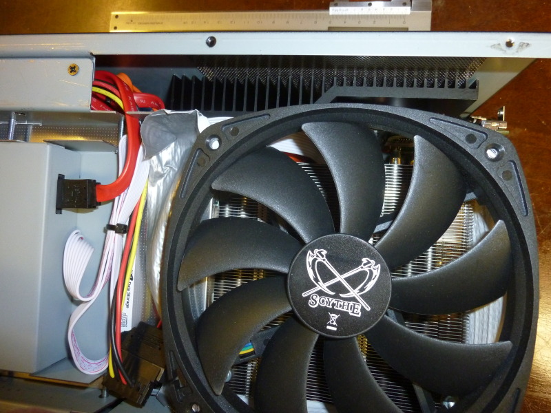 The pruned EVGA GF 210 in place. (Bracket and air duct still to be mounted)