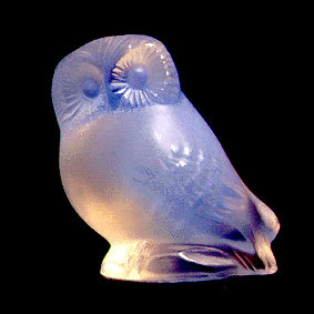 [Glass owl with metal vapour scatterers]